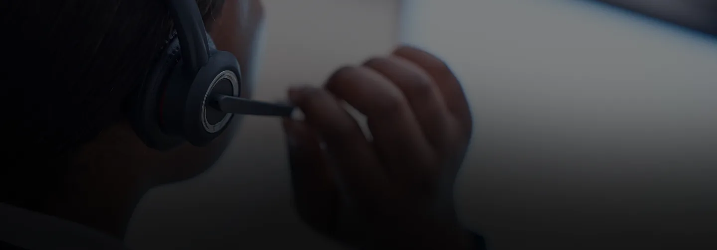 Customer support representative wearing a headset